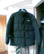 5,000\�̃_�E���W���P�b�g